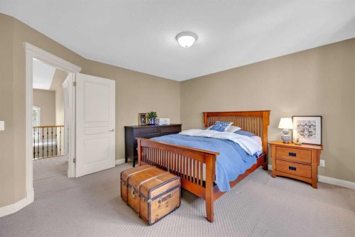 97 Strathridge Close Sw, Calgary, AB - Indoor Photo Showing Bedroom