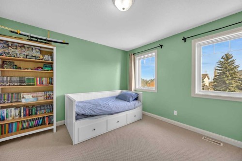 97 Strathridge Close Sw, Calgary, AB - Indoor Photo Showing Bedroom