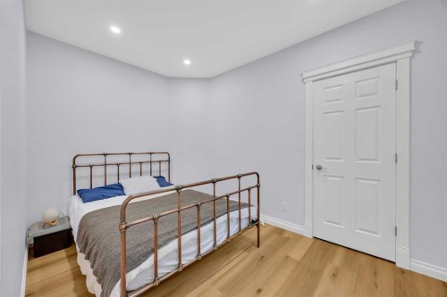 97 Strathridge Close Sw, Calgary, AB - Indoor Photo Showing Bedroom