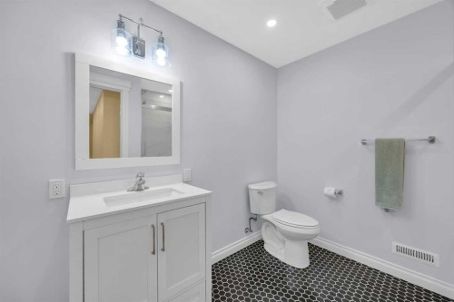 97 Strathridge Close Sw, Calgary, AB - Indoor Photo Showing Bathroom