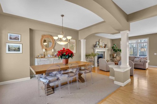 97 Strathridge Close Sw, Calgary, AB - Indoor With Fireplace