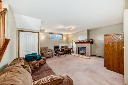 126 Strathmore Lakes Bend, Strathmore, AB - Indoor Photo Showing Living Room With Fireplace