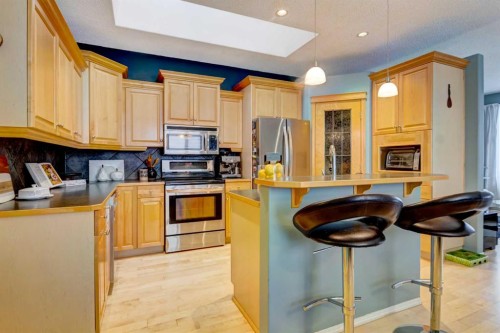27 Elgin Drive Se, Calgary, AB - Indoor Photo Showing Kitchen With Stainless Steel Kitchen