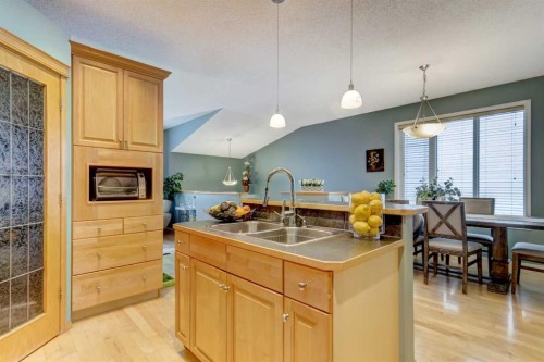 27 Elgin Drive Se, Calgary, AB - Indoor Photo Showing Kitchen With Double Sink