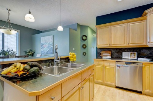 27 Elgin Drive Se, Calgary, AB - Indoor Photo Showing Kitchen With Double Sink
