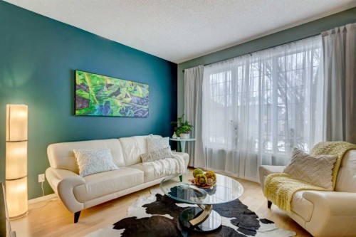 27 Elgin Drive Se, Calgary, AB - Indoor Photo Showing Living Room