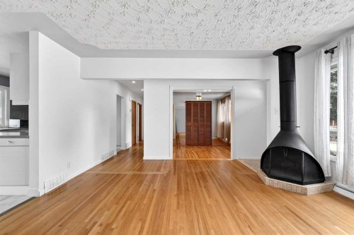 79 Hillary Crescent Sw, Calgary, AB - Indoor Photo Showing Other Room