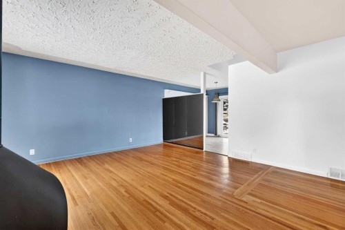 79 Hillary Crescent Sw, Calgary, AB - Indoor Photo Showing Other Room