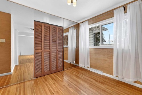 79 Hillary Crescent Sw, Calgary, AB - Indoor Photo Showing Other Room