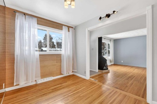 79 Hillary Crescent Sw, Calgary, AB - Indoor Photo Showing Other Room