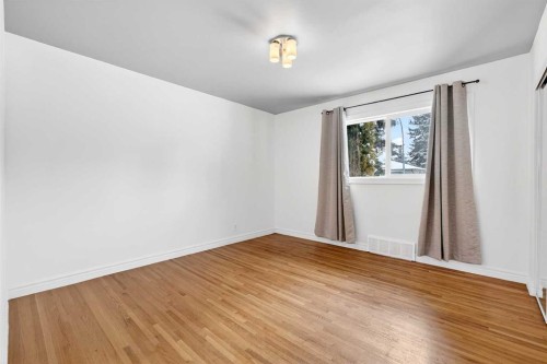 79 Hillary Crescent Sw, Calgary, AB - Indoor Photo Showing Other Room