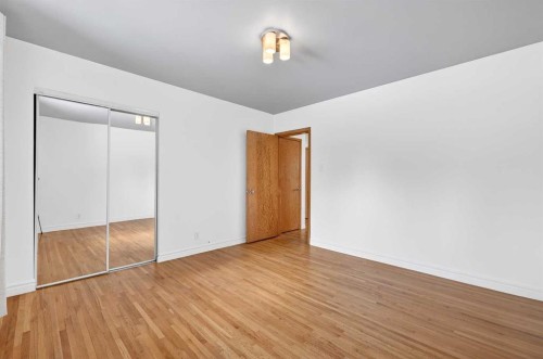 79 Hillary Crescent Sw, Calgary, AB - Indoor Photo Showing Other Room