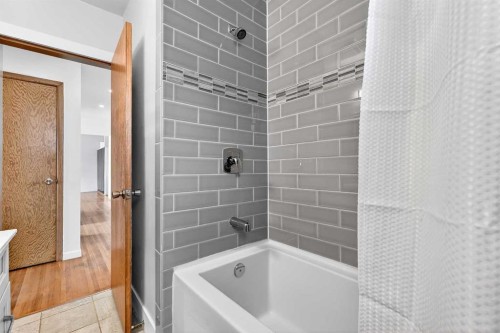 79 Hillary Crescent Sw, Calgary, AB - Indoor Photo Showing Bathroom