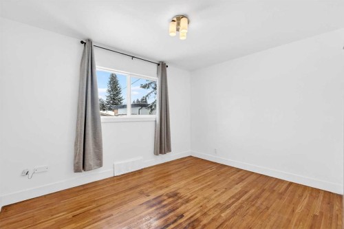 79 Hillary Crescent Sw, Calgary, AB - Indoor Photo Showing Other Room