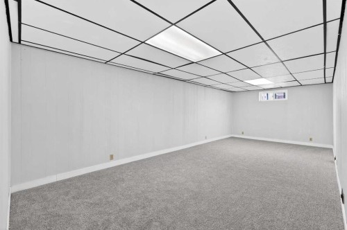 79 Hillary Crescent Sw, Calgary, AB - Indoor Photo Showing Other Room