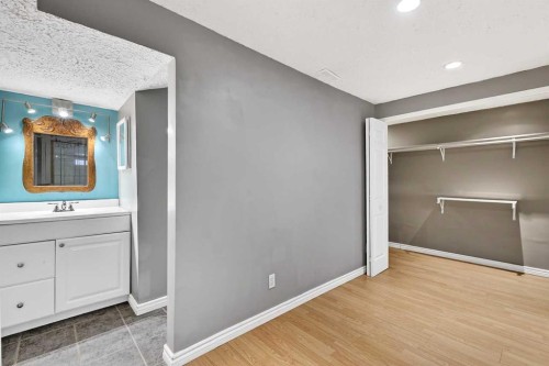 79 Hillary Crescent Sw, Calgary, AB - Indoor Photo Showing Other Room