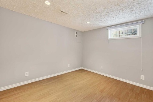 79 Hillary Crescent Sw, Calgary, AB - Indoor Photo Showing Other Room