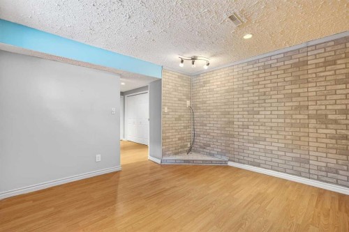 79 Hillary Crescent Sw, Calgary, AB - Indoor Photo Showing Other Room
