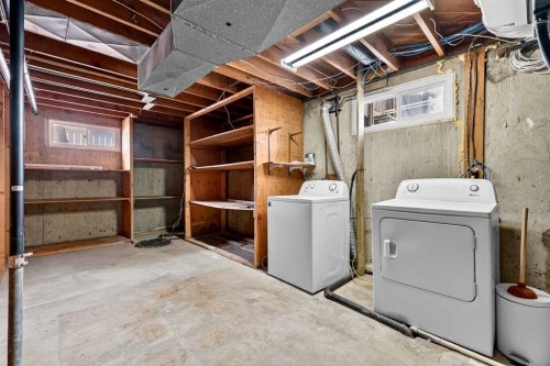 79 Hillary Crescent Sw, Calgary, AB - Indoor Photo Showing Laundry Room