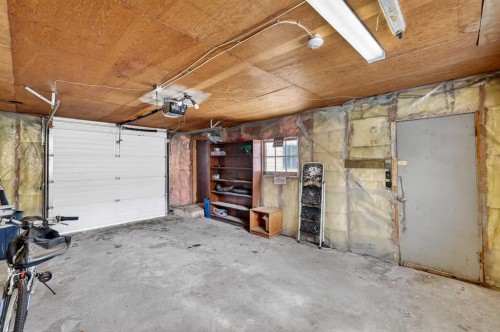 79 Hillary Crescent Sw, Calgary, AB - Indoor Photo Showing Garage