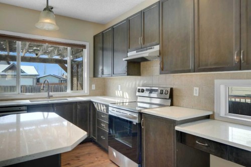 1833 New Brighton Drive Sw, Calgary, AB - Indoor Photo Showing Kitchen With Upgraded Kitchen