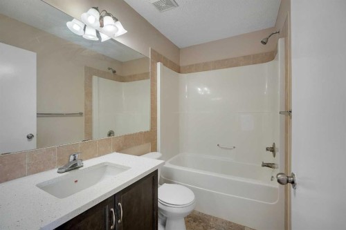 1833 New Brighton Drive Sw, Calgary, AB - Indoor Photo Showing Bathroom