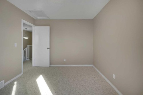 1833 New Brighton Drive Sw, Calgary, AB - Indoor Photo Showing Other Room