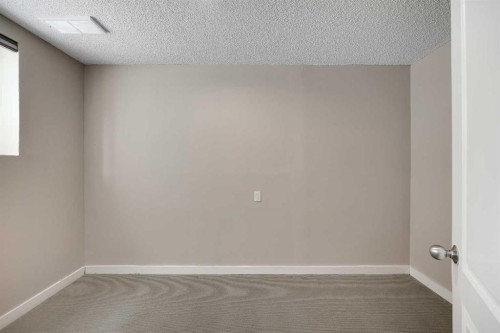 1833 New Brighton Drive Sw, Calgary, AB - Indoor Photo Showing Other Room