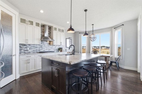 1469 Aldrich Place, Carstairs, AB - Indoor Photo Showing Kitchen With Upgraded Kitchen