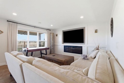 1469 Aldrich Place, Carstairs, AB - Indoor Photo Showing Living Room With Fireplace