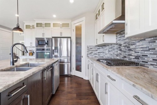 1469 Aldrich Place, Carstairs, AB - Indoor Photo Showing Kitchen With Double Sink With Upgraded Kitchen