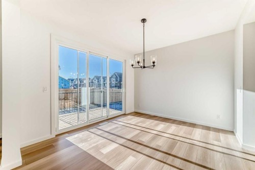 67 Creekside Path Sw, Calgary, AB - Indoor Photo Showing Other Room