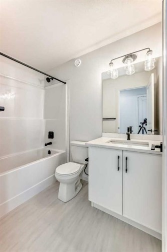 67 Creekside Path Sw, Calgary, AB - Indoor Photo Showing Bathroom