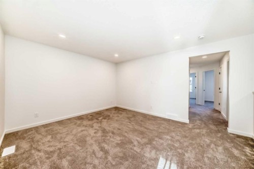 67 Creekside Path Sw, Calgary, AB - Indoor Photo Showing Other Room