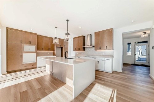 67 Creekside Path Sw, Calgary, AB - Indoor Photo Showing Kitchen