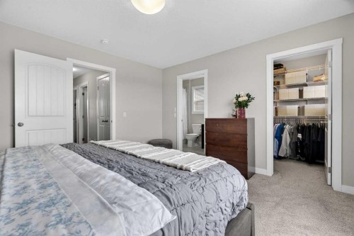 67 Wolf Willow Boulevard Se, Calgary, AB - Indoor Photo Showing Bedroom