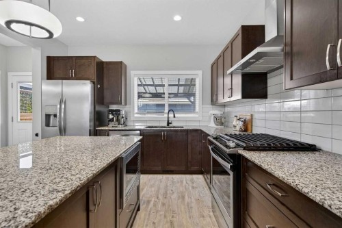 67 Wolf Willow Boulevard Se, Calgary, AB - Indoor Photo Showing Kitchen With Upgraded Kitchen