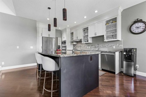 22 Wendham Place Sw, Calgary, AB - Indoor Photo Showing Kitchen With Upgraded Kitchen