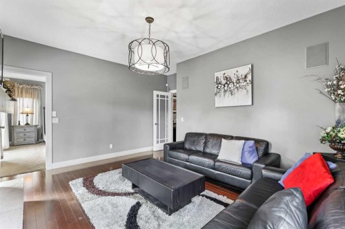 22 Wendham Place Sw, Calgary, AB - Indoor Photo Showing Living Room