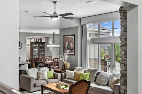 22 Wendham Place Sw, Calgary, AB - Indoor Photo Showing Living Room