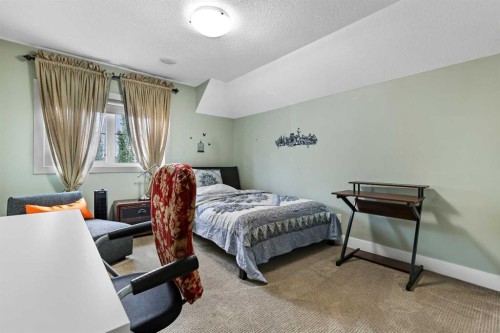 22 Wendham Place Sw, Calgary, AB - Indoor Photo Showing Bedroom