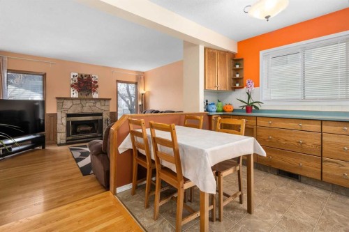 232 Millbank Drive Sw, Calgary, AB - Indoor With Fireplace