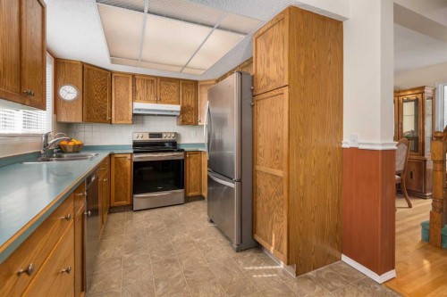 232 Millbank Drive Sw, Calgary, AB - Indoor Photo Showing Kitchen With Stainless Steel Kitchen With Double Sink