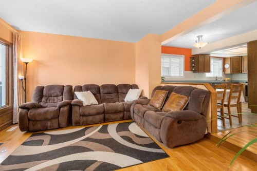 232 Millbank Drive Sw, Calgary, AB - Indoor Photo Showing Living Room