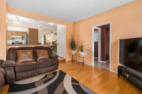 232 Millbank Drive Sw, Calgary, AB - Indoor Photo Showing Living Room