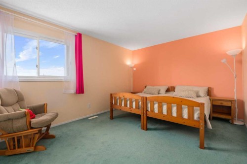232 Millbank Drive Sw, Calgary, AB - Indoor Photo Showing Bedroom