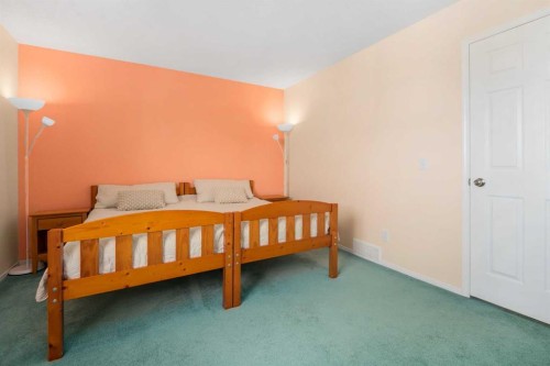 232 Millbank Drive Sw, Calgary, AB - Indoor Photo Showing Bedroom