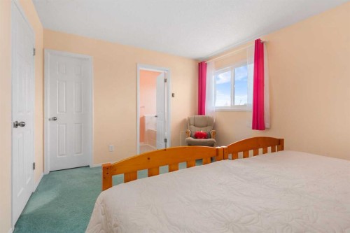 232 Millbank Drive Sw, Calgary, AB - Indoor Photo Showing Bedroom