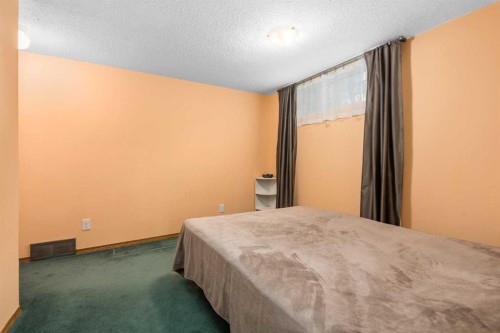 232 Millbank Drive Sw, Calgary, AB - Indoor Photo Showing Bedroom
