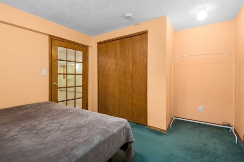 232 Millbank Drive Sw, Calgary, AB - Indoor Photo Showing Bedroom
